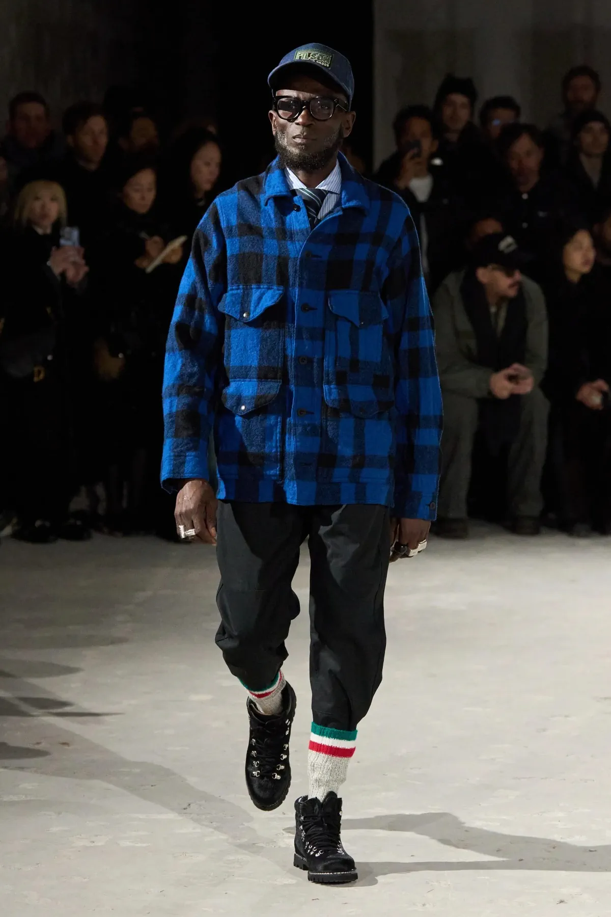 La collection automne 2025 de Junya Watanabe Man associe des vêtements de travail traditionnels à une touche urbaine