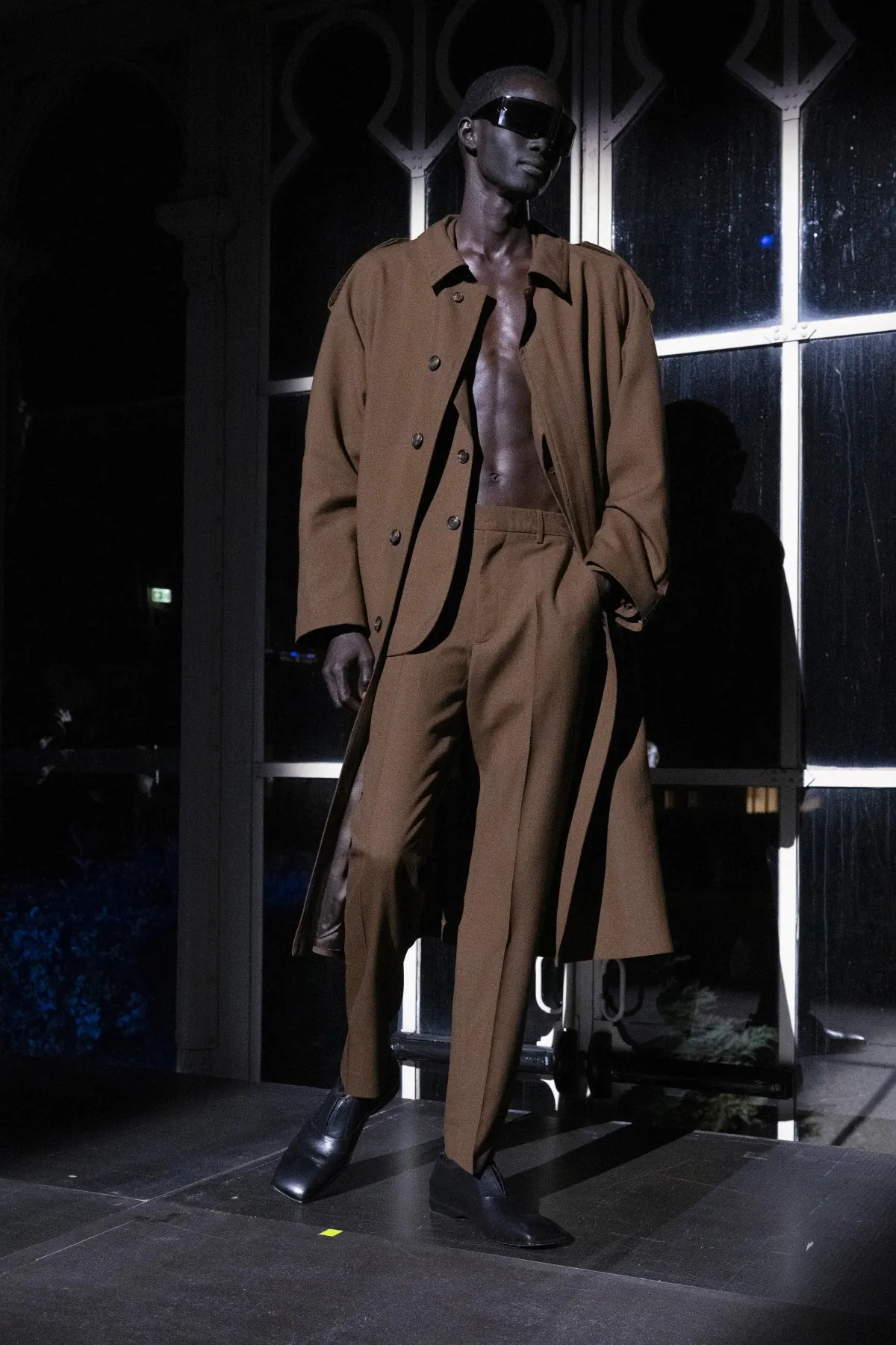 La collection automne 2025 de MM6 Maison Margiela pour le Pitti Uomo est placée sous le signe de la malice noire