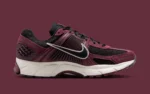 La Nike Zoom Vomero 5 « Dark Team Red » annonce le printemps 2025 avec un luxe polyvalent