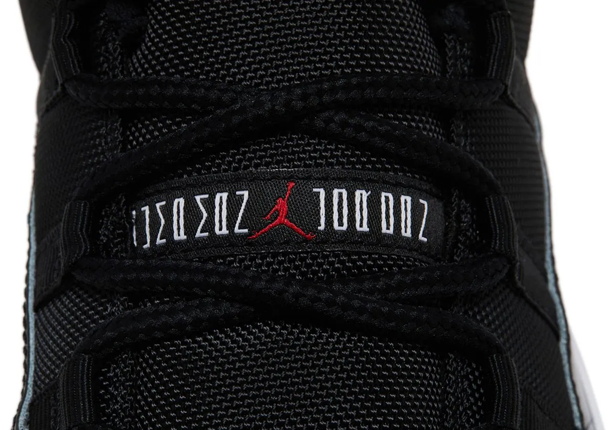 La Air Jordan 11 Low « Bred » fait son retour en 2025, s'inspirant des baskets exclusives de Michael Jordan lors des finales de 1996