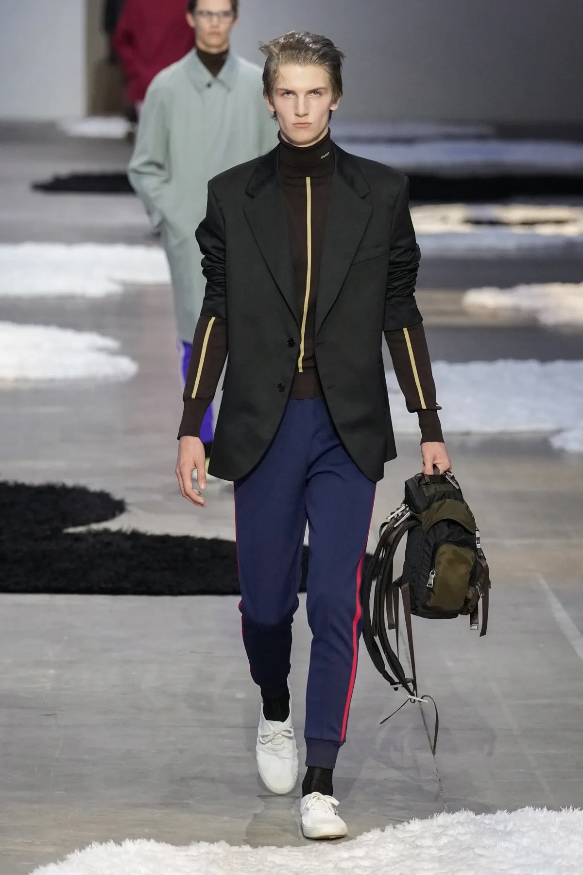La collection Printemps 2026 de PRADA révèle une mode masculine apaisée et authentique