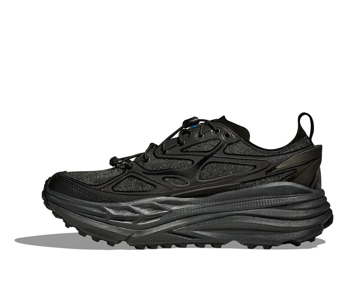 Avec la Stinson One7+, HOKA et Dover Street Market réinventent la chaussure de trail urbaine