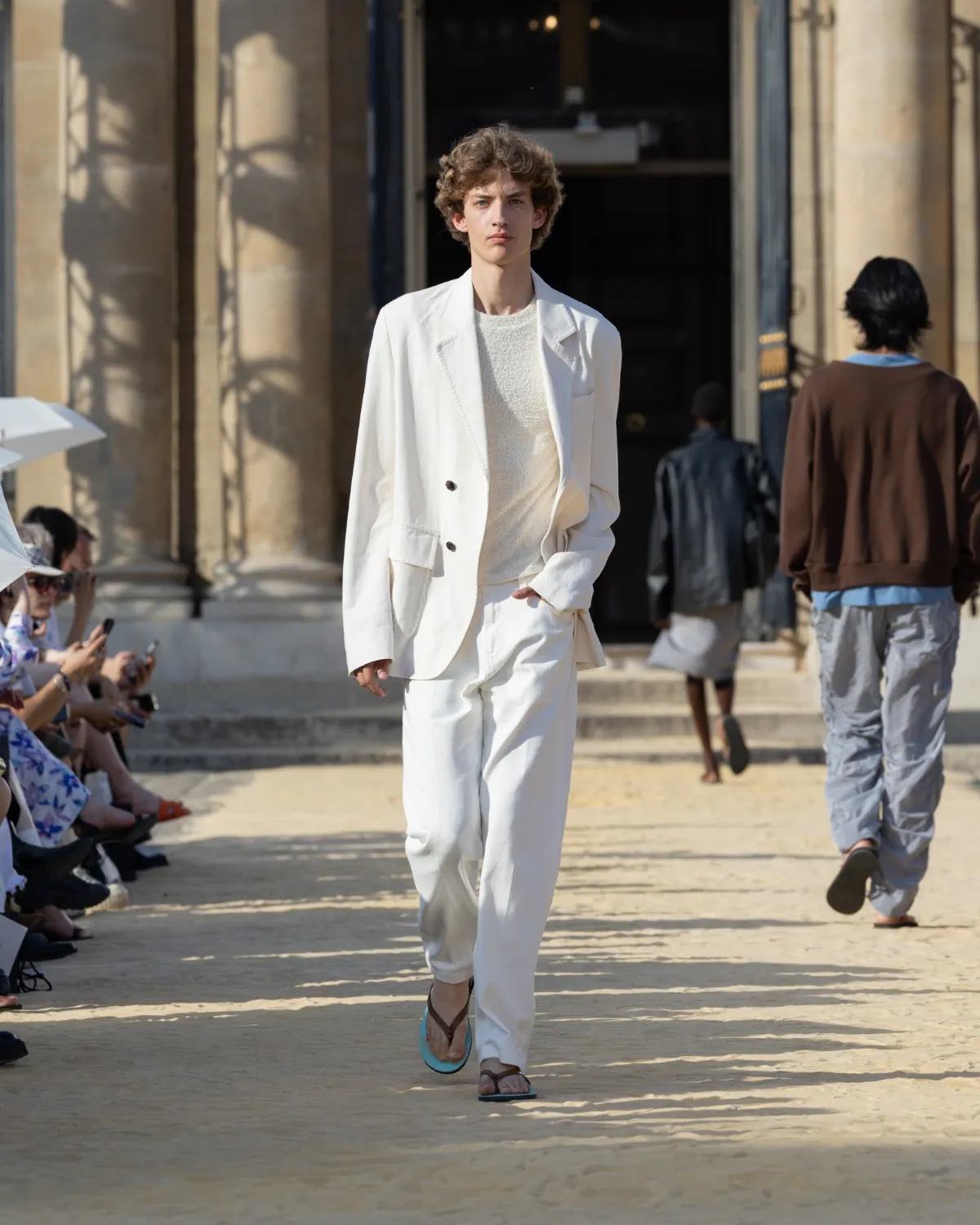 System Spring Summer 2027 Paris Fashion Week 12 SYSTEM Printemps 2027 - Hee-Soo Kim fait de l'errance de Knulp un idéal masculin