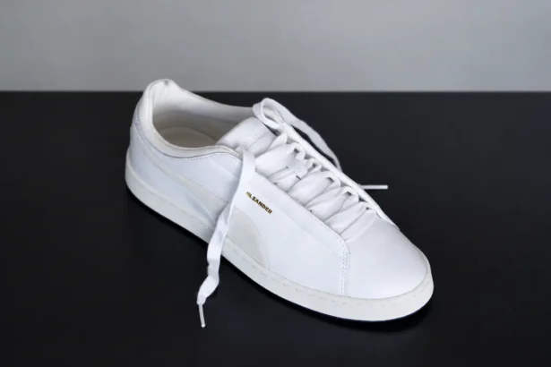PUMA et Jil Sander font renaître la Speedcat et la Suede sur les podiums milanais
