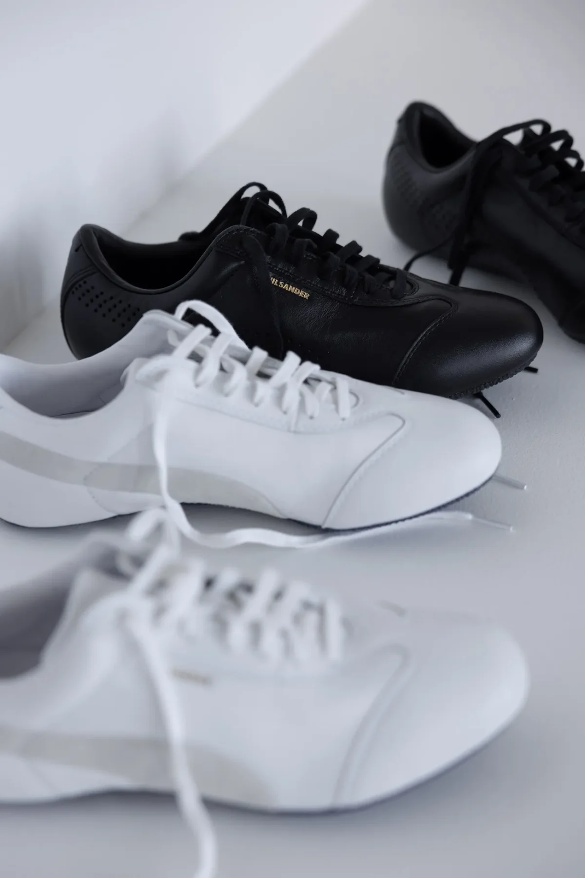 PUMA x Jil Sander Milan Printemps 2027 3 PUMA et Jil Sander font renaître la Speedcat et la Suede sur les podiums milanais