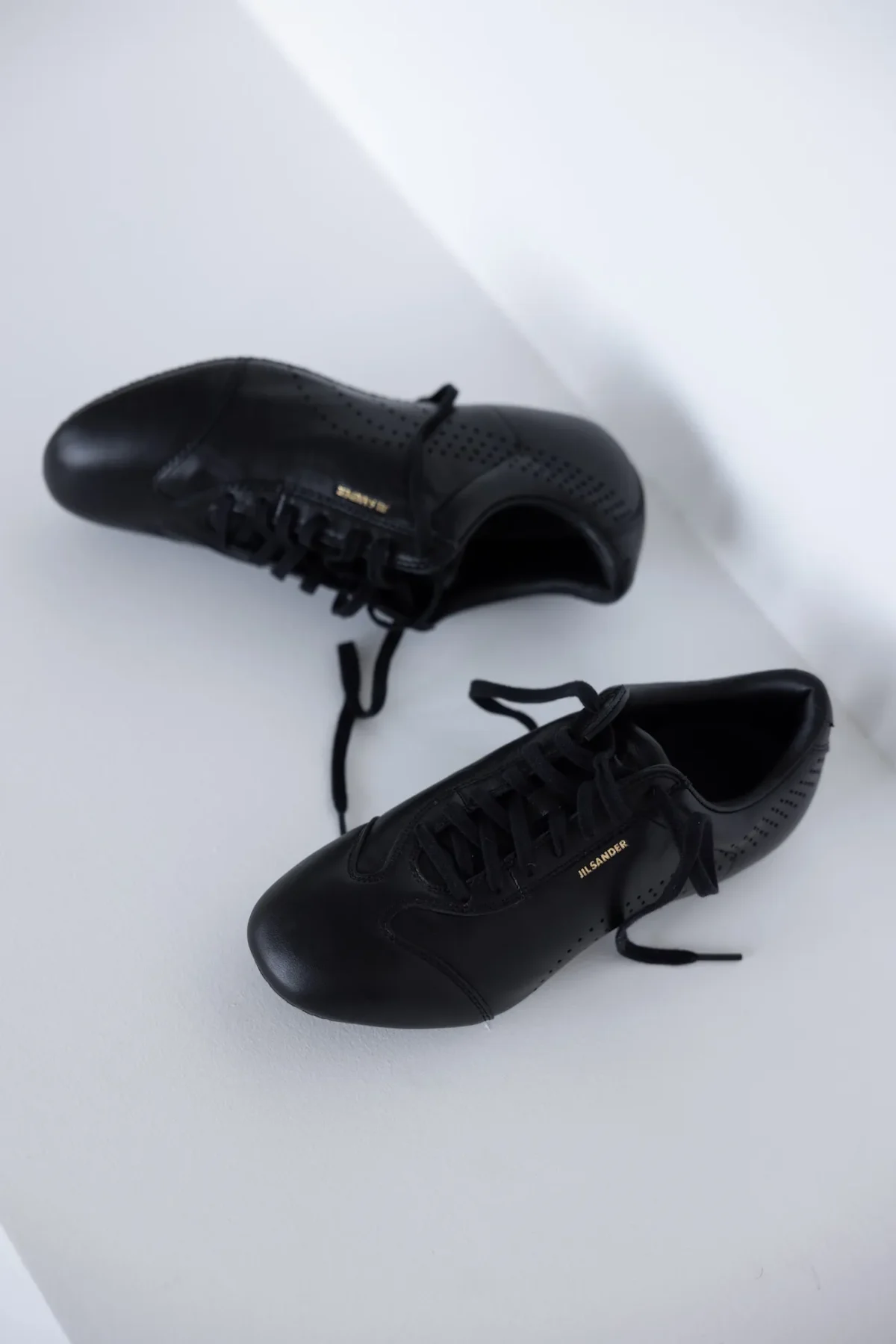 PUMA x Jil Sander Milan Printemps 2027 5 PUMA et Jil Sander font renaître la Speedcat et la Suede sur les podiums milanais